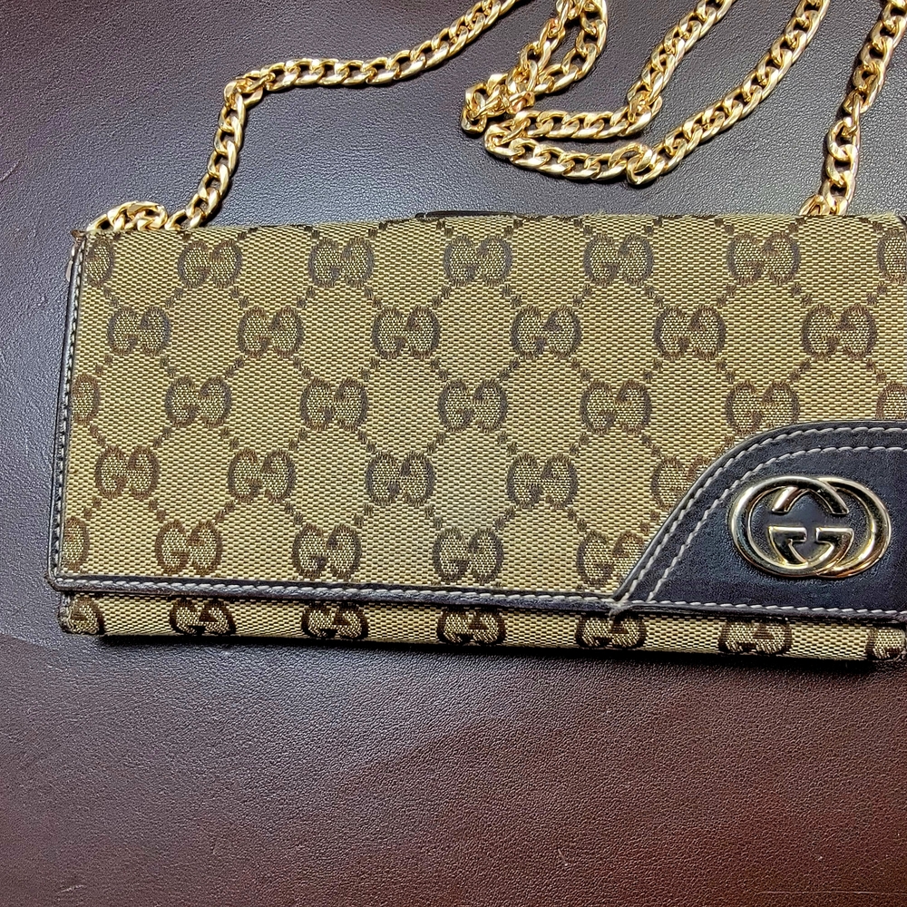 Gucci Brown and Gold Clutch with Iconic Monogram